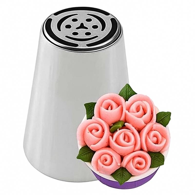 Russian piping tip with symmetrical petal openings and a central three-prong design, used for creating detailed buttercream floral decorations.