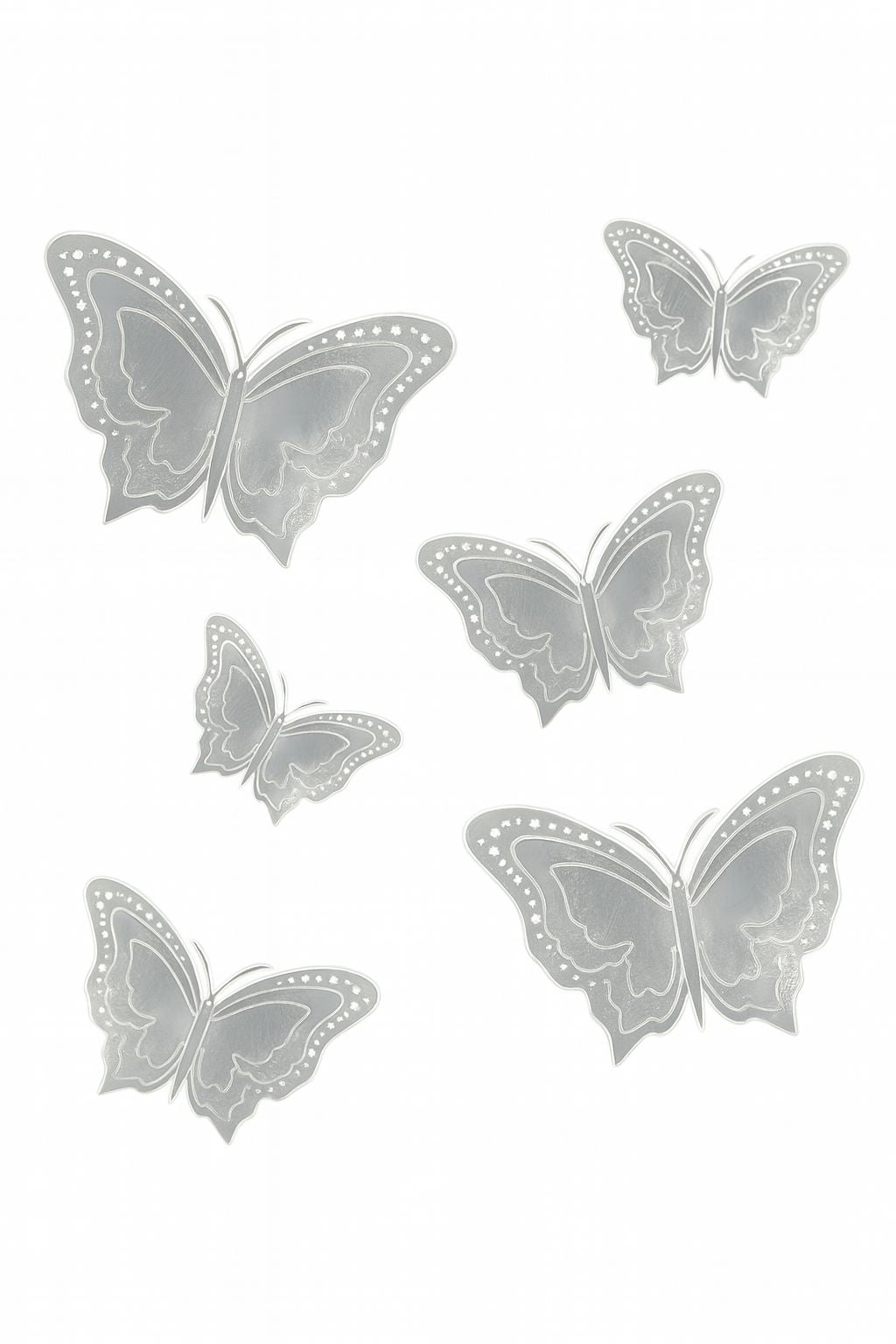Set of six silver 3D butterfly cake toppers in various sizes with mirror shine and intricate wing design