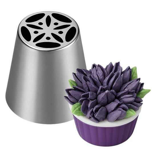 Stainless steel Russian piping tip with a purple chrysanthemum-style buttercream flower on a cupcake.