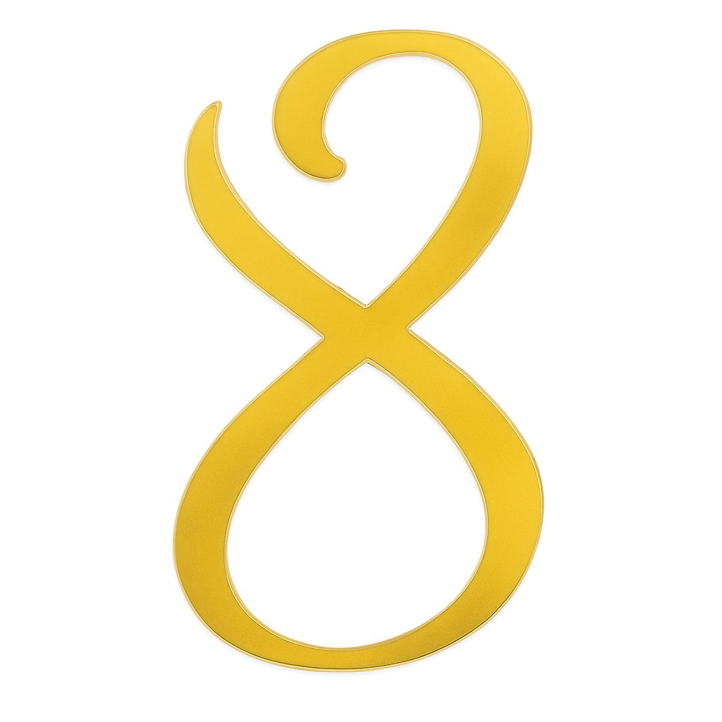 Gold mirror acrylic cake topper shaped like the number 8