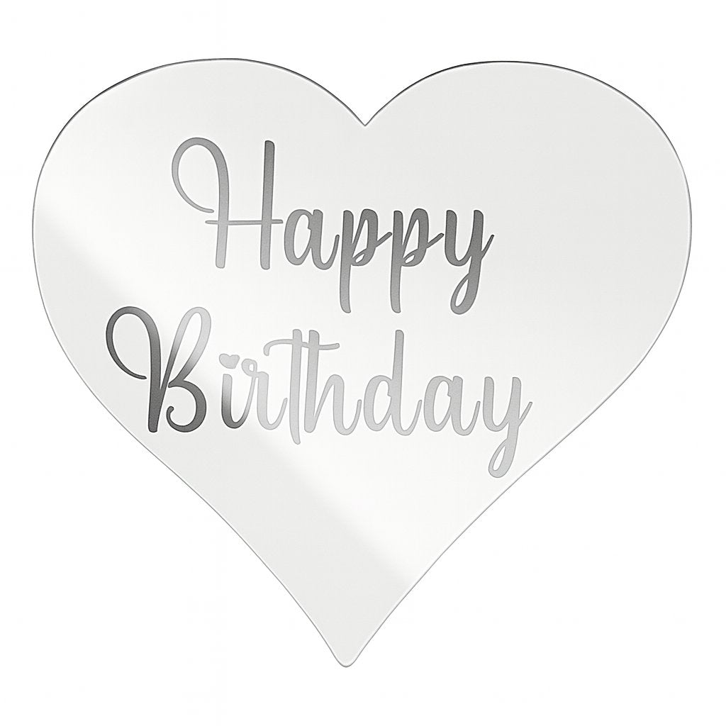 Silver heart-shaped acrylic cake topper with “Happy Birthday” text