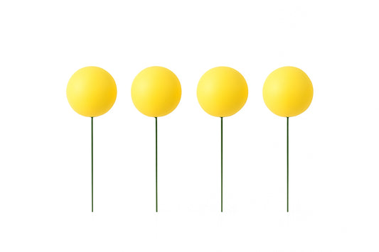 Set of 4 glossy yellow cake topper balls with green wire stems – cheerful balloon-style decoration