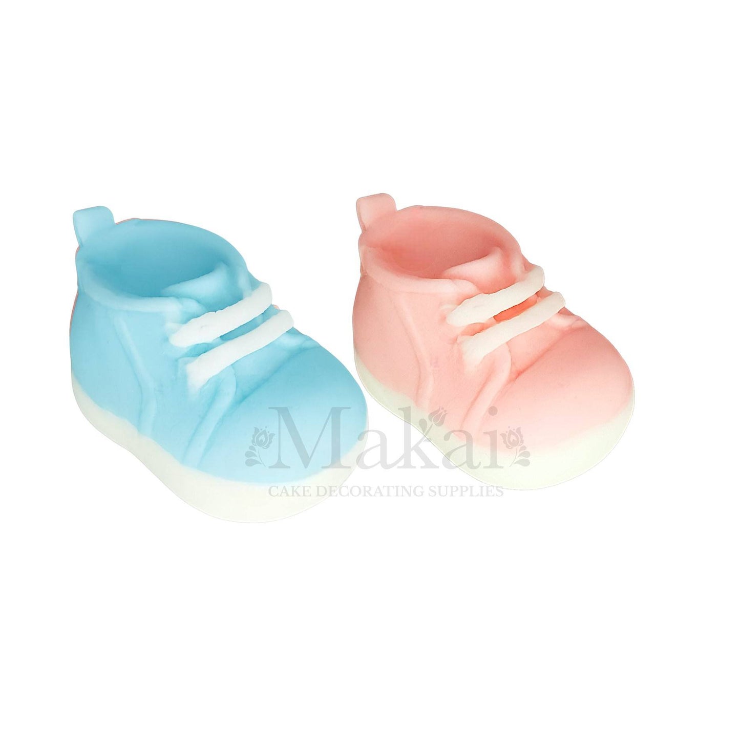 Pink and blue baby shoe fondant cake toppers for baby shower and gender reveal cakes.