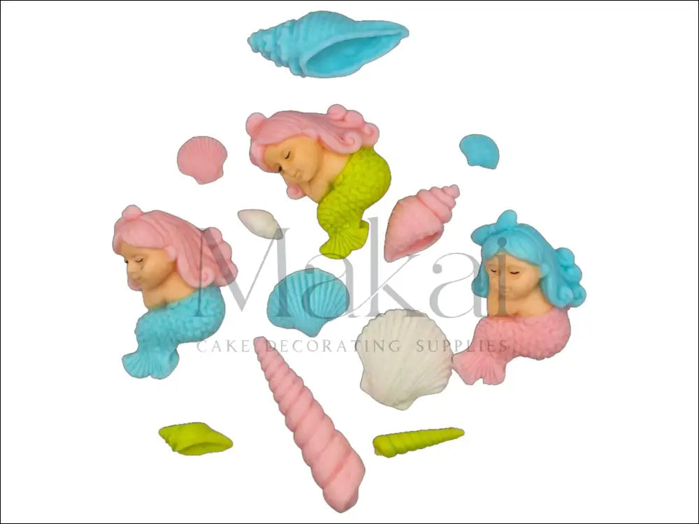 A pastel-themed mini mermaid cake topper set featuring three small mermaids in soft pink, blue, and light green tones, with various colourful seashells, perfect for an ocean-themed cake.