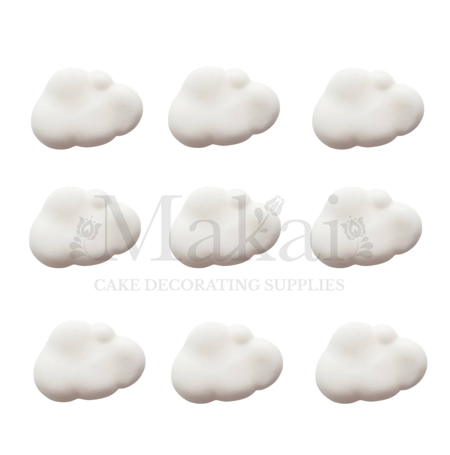White cloud cake toppers arranged on a white background, handmade decorations from Makai Cake Decorating Supplies