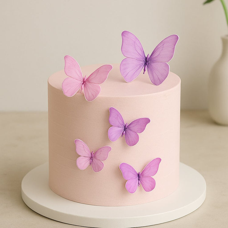 Celebration cake adorned with high-quality 3D butterflies, perfect for birthdays, weddings, and floral-themed events