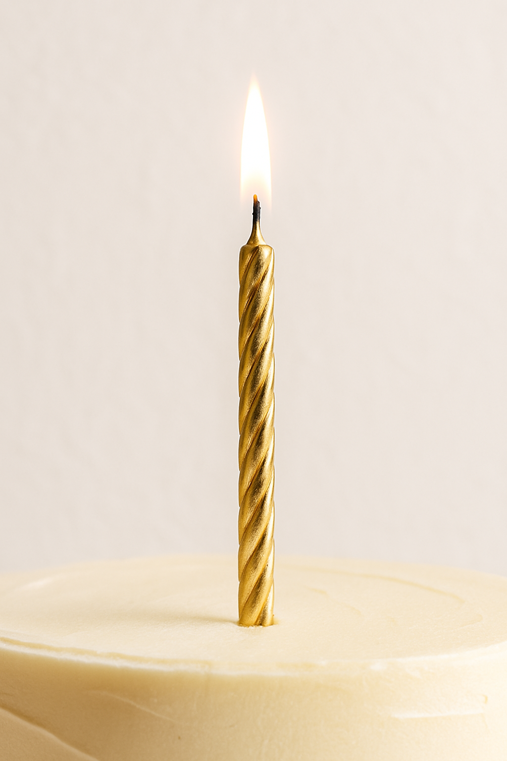 Stylish cake adorned with luxury spiral birthday candles.