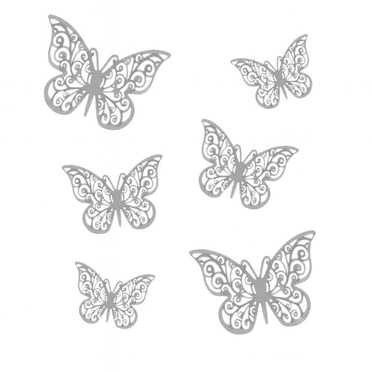 Set of six silver mirror butterflies with swirl cut-out wings, perfect for cake decoration in magical or elegant themes