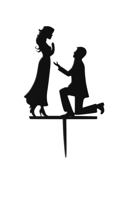Black cake topper with engagement proposal silhouette – man on one knee