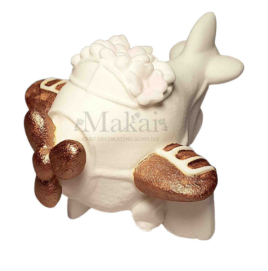 White and gold fondant airplane cake topper – side view