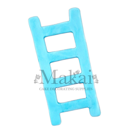 Baby‑blue fondant ladder cake topper for sky and baby‑boy cakes.