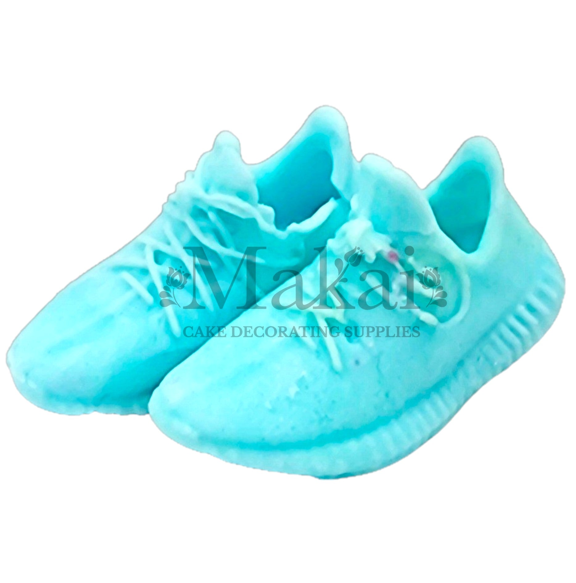 Pair of baby‑blue fondant running‑shoe toppers for sports and gender‑reveal cakes.