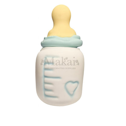 Edible baby bottle cake topper made from sugar paste – perfect for baby showers, christenings, and gender reveal cakes.
