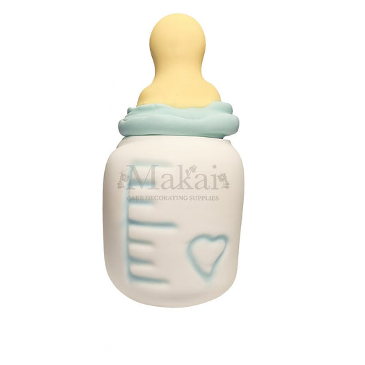 Edible baby bottle cake topper made from sugar paste – perfect for baby showers, christenings, and gender reveal cakes.