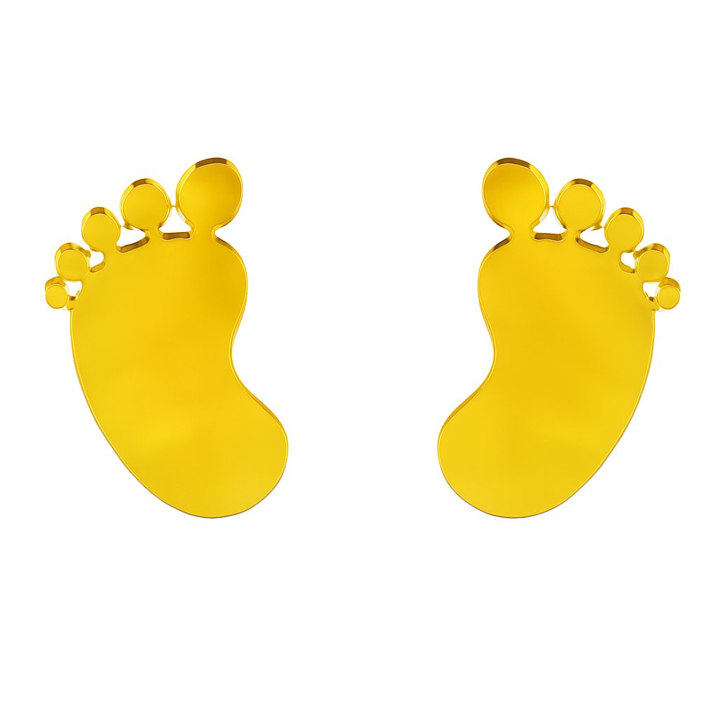 Two gold acrylic baby feet cake toppers