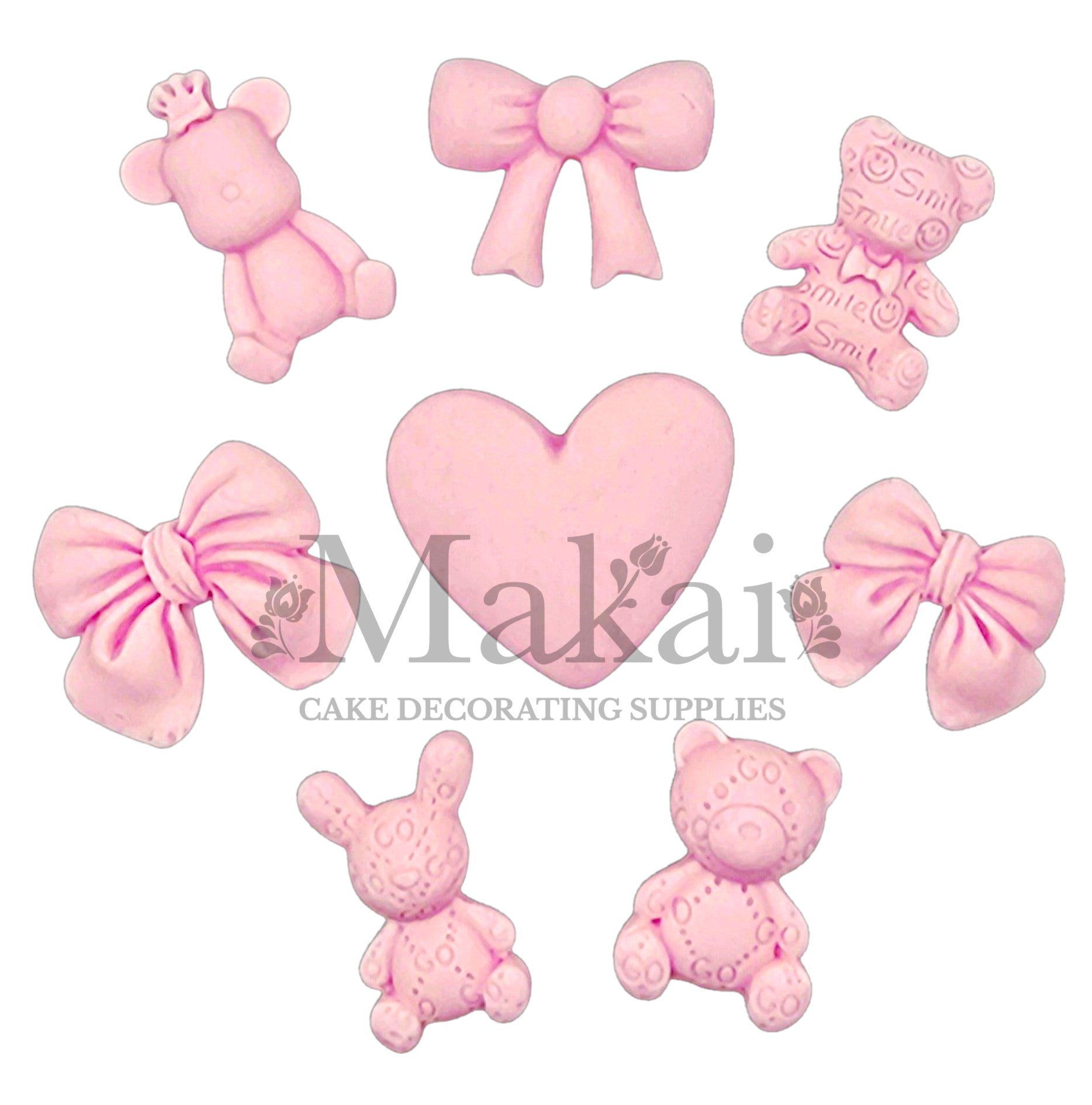 Edible pink baby girl cake toppers including teddy bears, bows, heart and bunny—perfect for baby showers and girl birthday cakes.