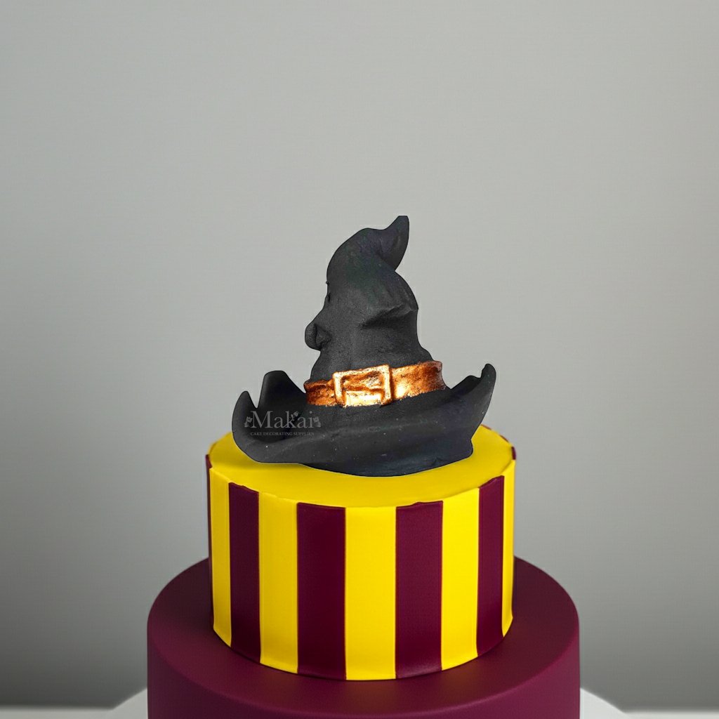 Yellow and Burgundy striped Wizard cake with witch hat