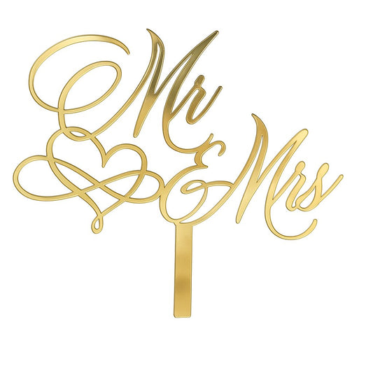 Gold acrylic “Mr & Mrs” cake topper with elegant heart-shaped ampersand script