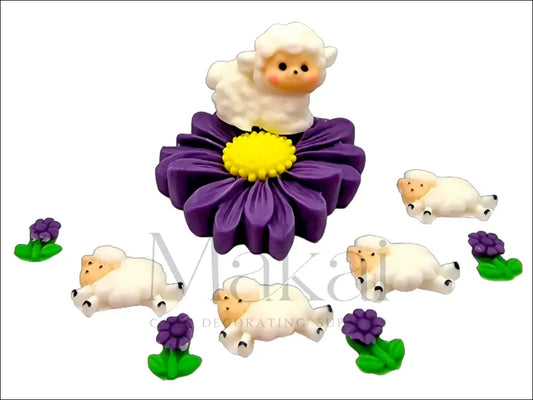 Large purple flower, lying lamb, small lambs, and small purple flowers fondant cake decoration set.