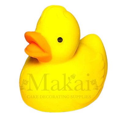 Edible 3D fondant mummy duck cake topper in bright yellow with orange beak