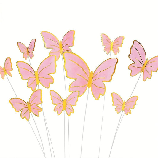 Pink paper butterfly cake decorations in various sizes, perfect for birthday cakes and themed celebrations.