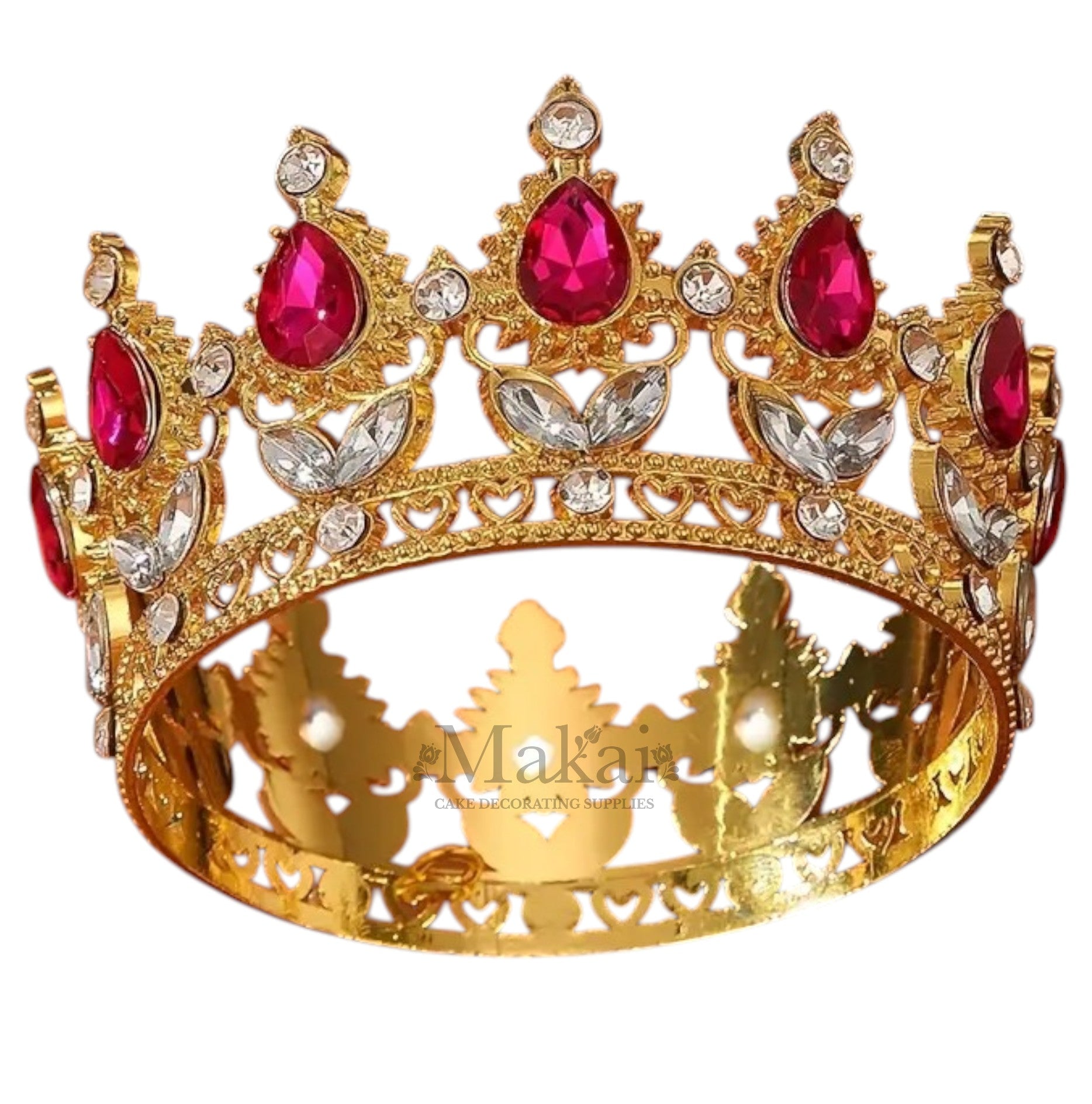 Large gold cake crown with soft pink crystals and heart cutouts