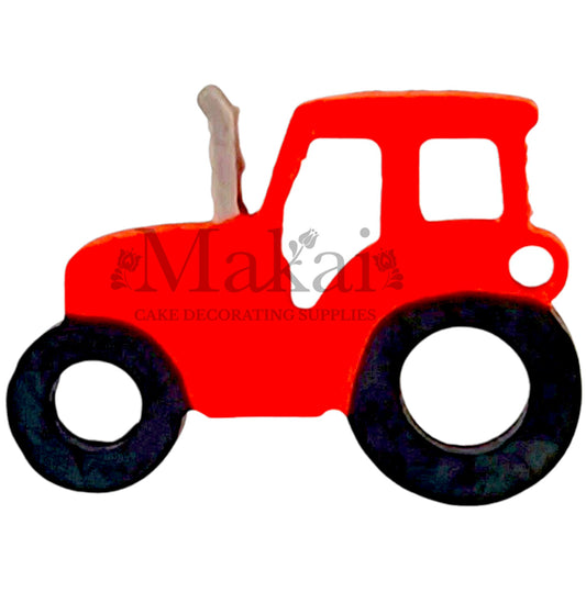 Edible red tractor cake topper with black wheels for farm birthday cakes