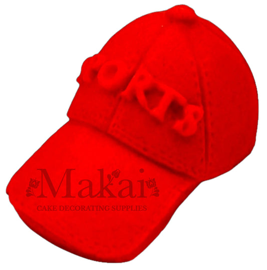 Bright red fondant sport cap topper for fan and match‑day cakes.