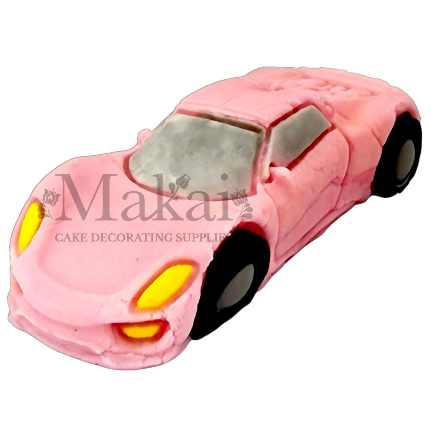 Edible baby‑pink sport car fondant cake topper for racing and kids’ birthday cakes.