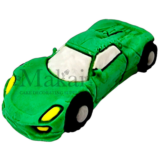 Edible green sport car fondant decoration for elegant racing cakes.