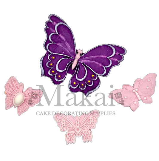 Edible butterfly cake toppers in purple and pink—ideal for birthday, wedding or fairy garden themed cakes.