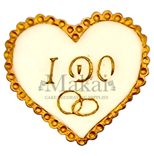 Edible wedding heart cake topper with ‘I Do’ and gold rings – perfect for romantic celebration cakes.