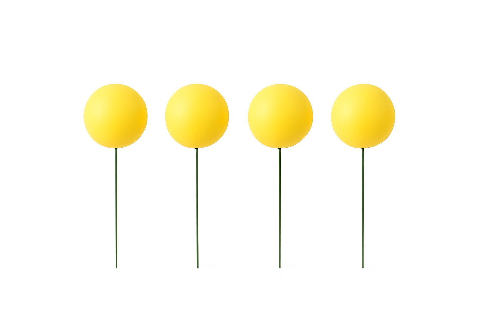 Set of 4 glossy yellow cake topper balls with green wire stems – cheerful balloon-style decoration