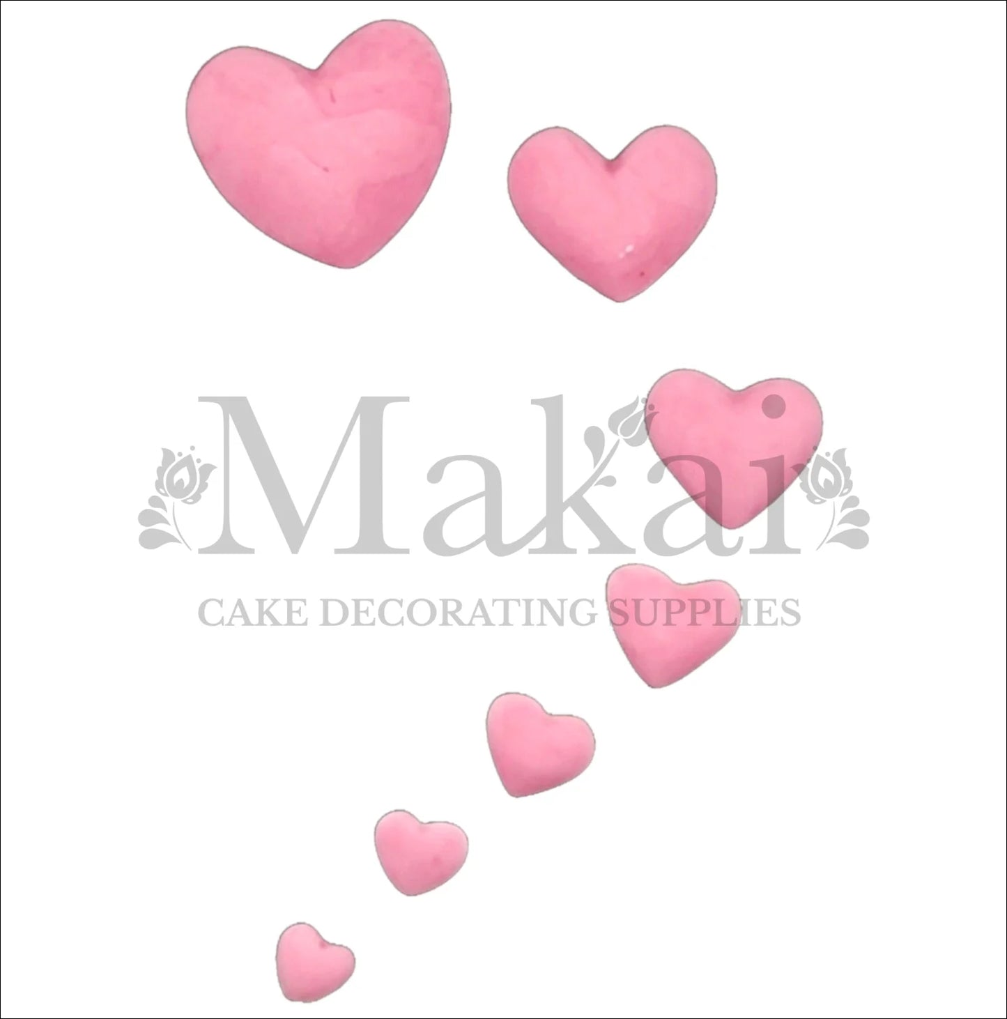 Set of six edible pink fondant hearts in graduated sizes for baby‑girl and romantic cake decorating.