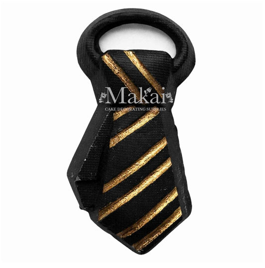 Black and gold tie cake decoration made from fondant, suitable for elegant wedding and gentleman style cakes