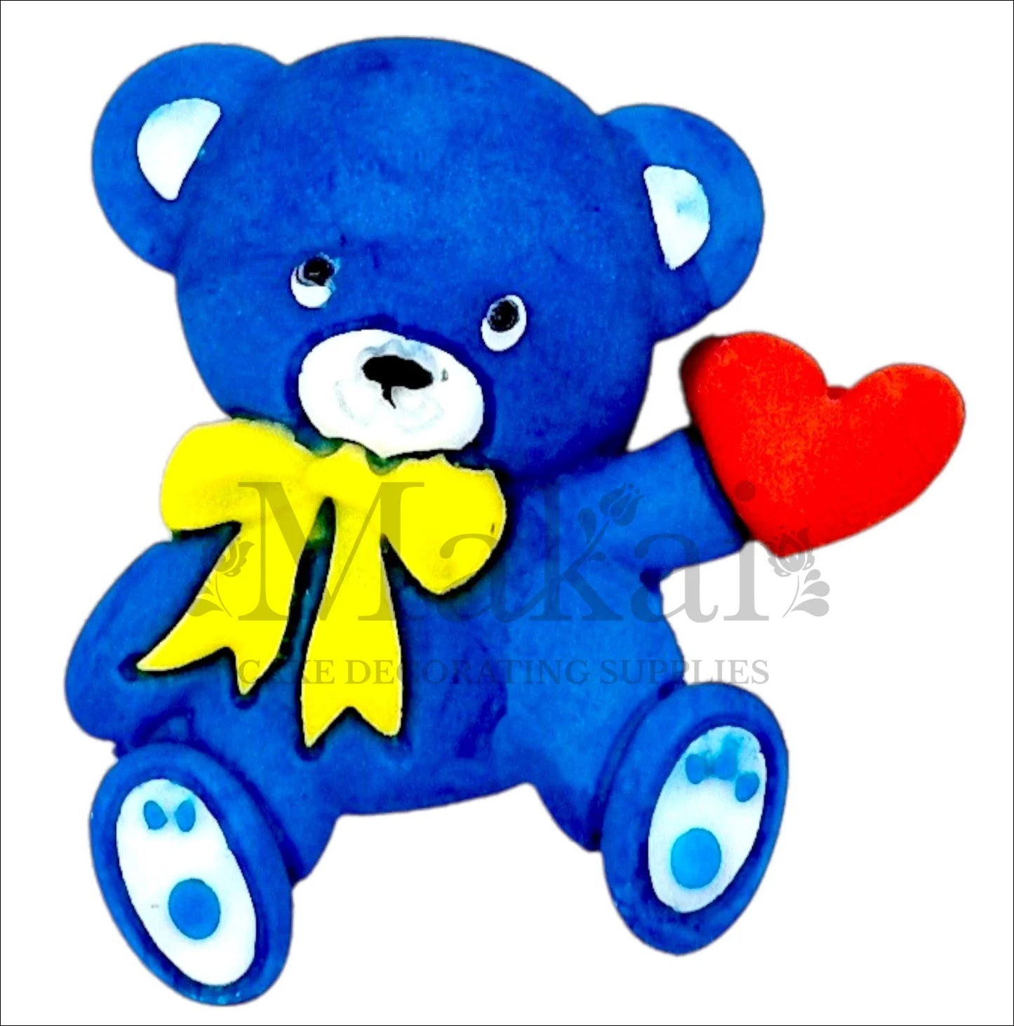 Edible blue teddy bear cake topper with red heart and yellow bow – perfect for baby showers, birthdays, and special occasions.
