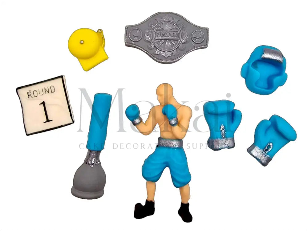 8-piece boxing cake topper set in blue, featuring a boxer figurine, gloves, a championship belt, a ring bell, and other boxing-themed decorations.
