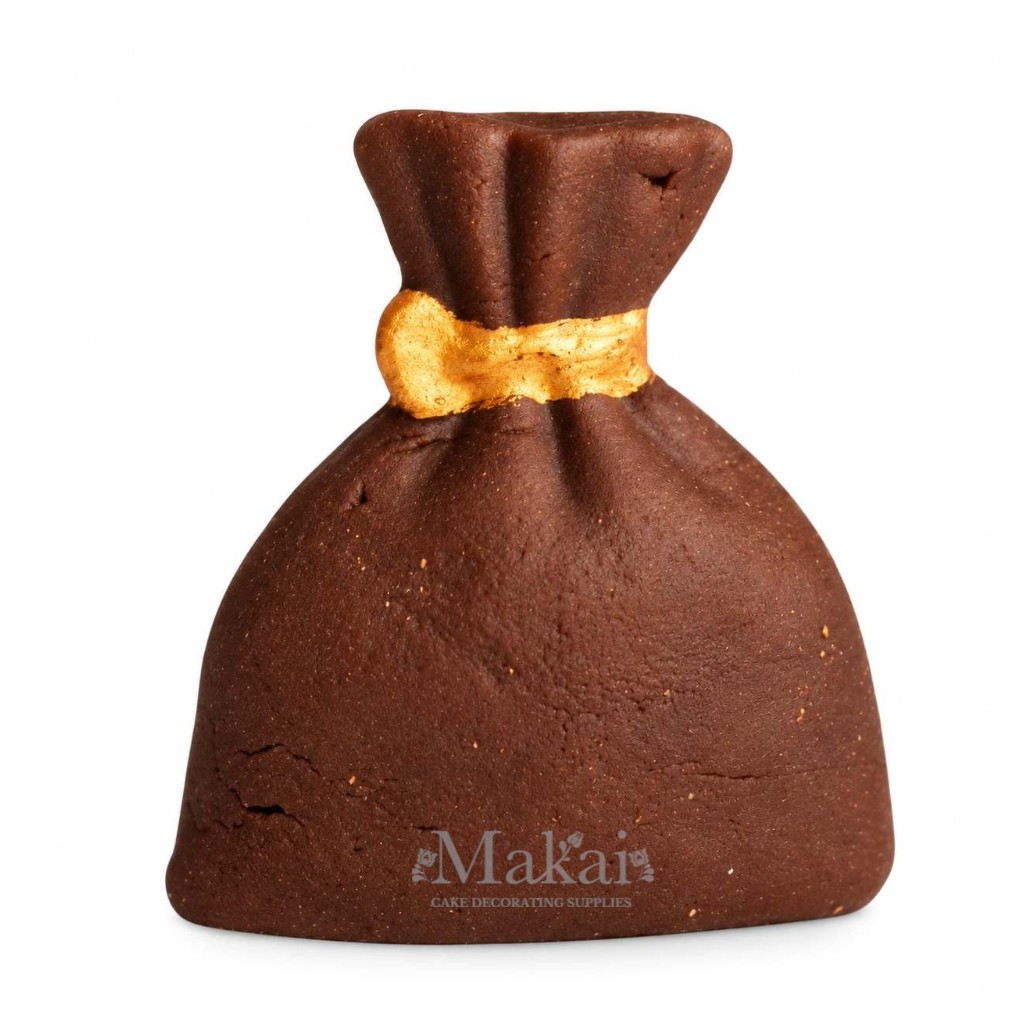 Front view of brown fondant sack Western cake decoration with gold tie