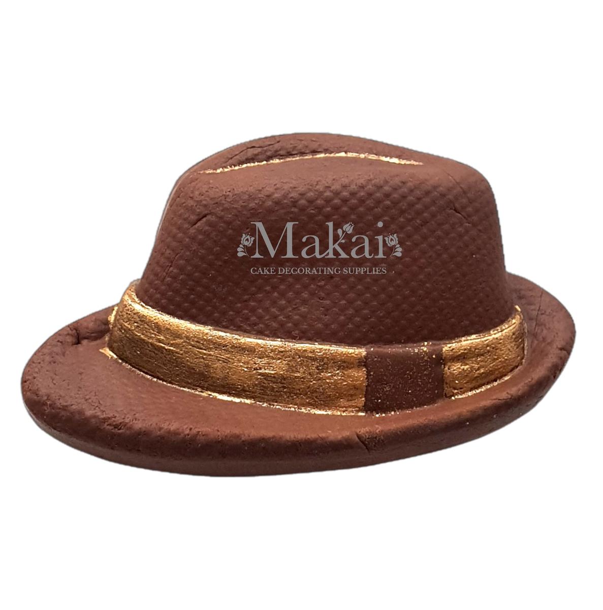 Gentleman hat cake topper with gold detail for masculine cake designs