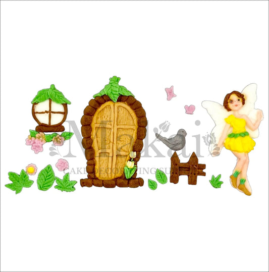 Edible cake topper set featuring a brown fairy door, yellow-dressed fairy, pastel flowers, bird, and leaves – perfect for enchanted garden or woodland cakes.