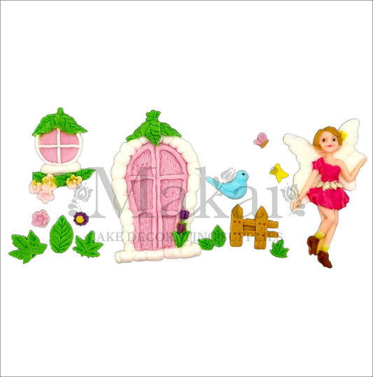 Edible fairy garden cake topper set with pink door, flowers, blue bird, and fairy figurine – perfect for fantasy and woodland-themed cakes.