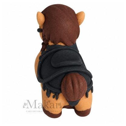 Rear view of handmade fondant horse cake topper with brown tail, black saddle and bridle details.