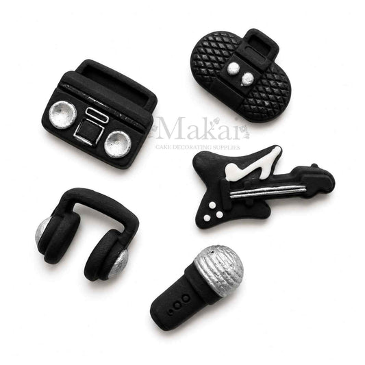 Black and silver fondant music cake decorations with guitar microphone headphones and radios