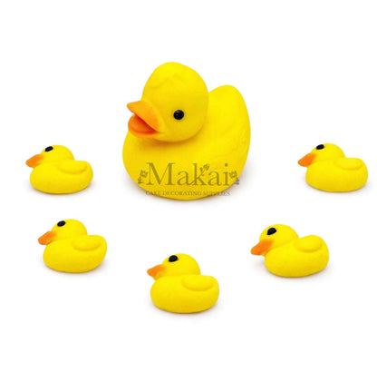 Edible fondant cake toppers of a yellow mother duck with five ducklings, perfect for baby‑shower and duck themed cakes.