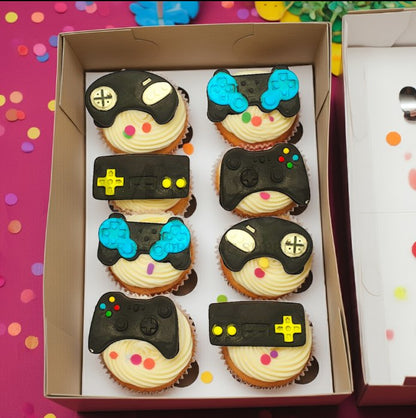 Edible gaming controller cupcake toppers in different video game designs, perfect for kids parties and gamer-themed celebrations.