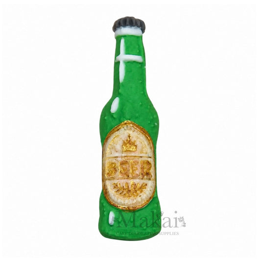 Handmade green beer bottle fondant cake decoration with gold-effect BEER label, black bottle cap and flat back on white background.