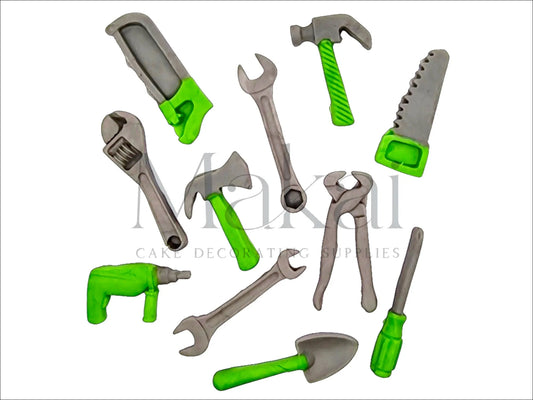 Green fondant tool set with various hand tools for cake decoration – hammer, wrench, saw, drill, and more.
