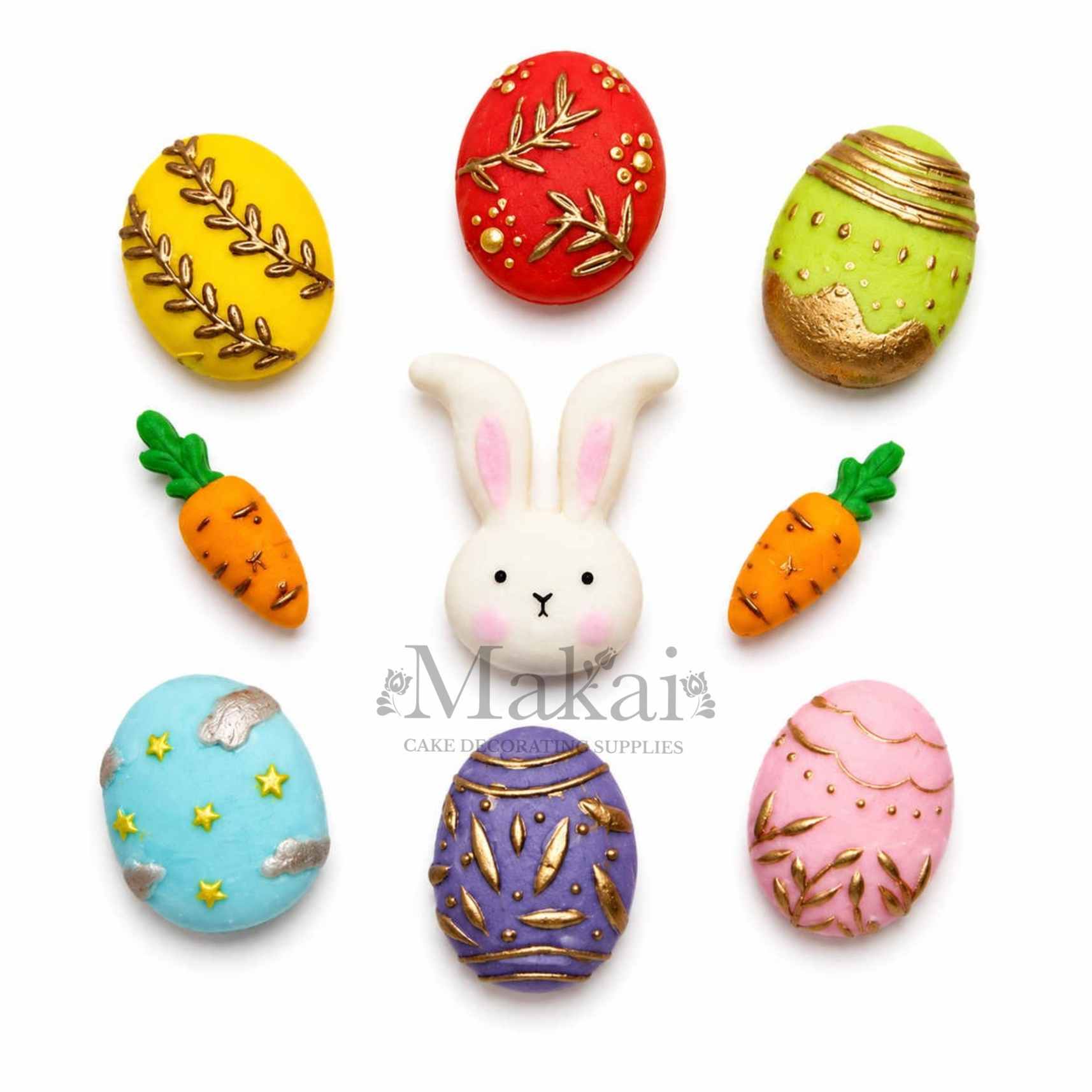 Handmade Easter fondant cake decorations with bunny, carrots and colourful decorated eggs for Easter and spring cakes