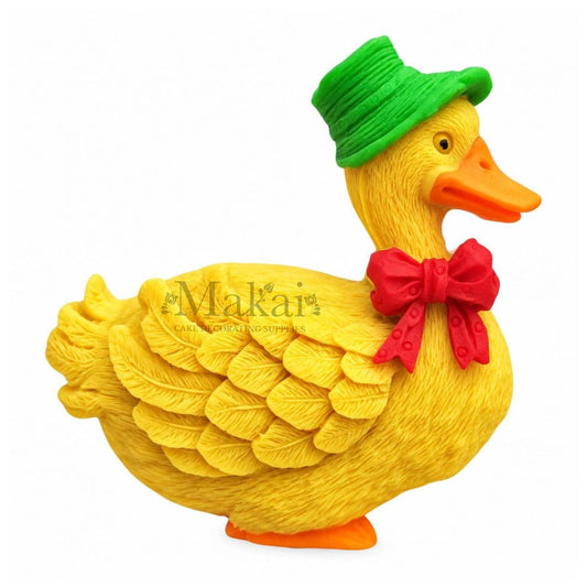 Yellow fondant duck with green hat and red bow flat-back cake decoration