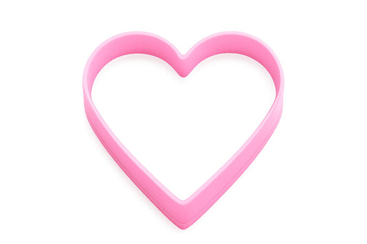 Pink heart-shaped cookie cutter on a plain background, designed in a soft pastel style.
